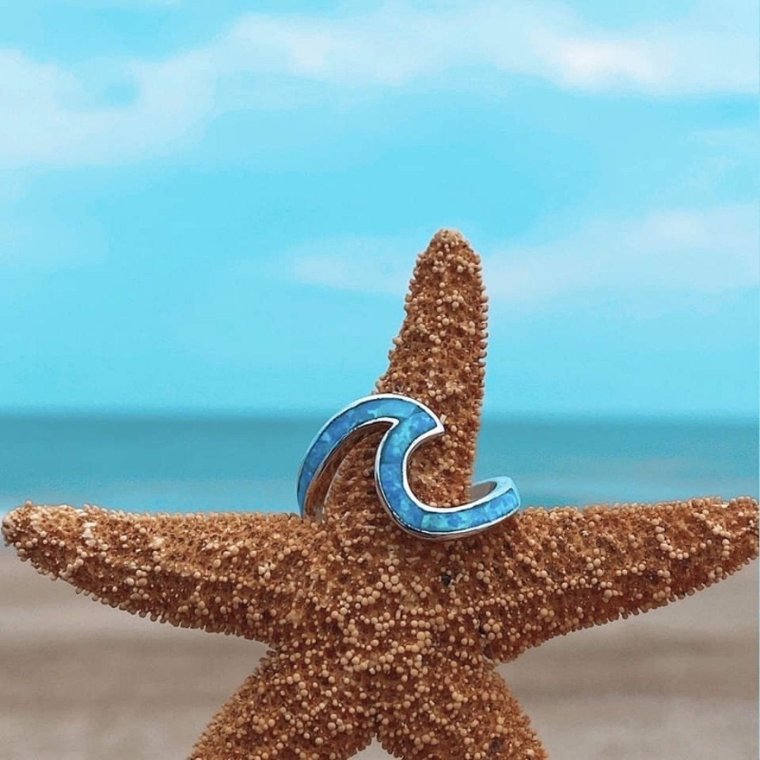 Anello a Onda in Argento con Opale Blu